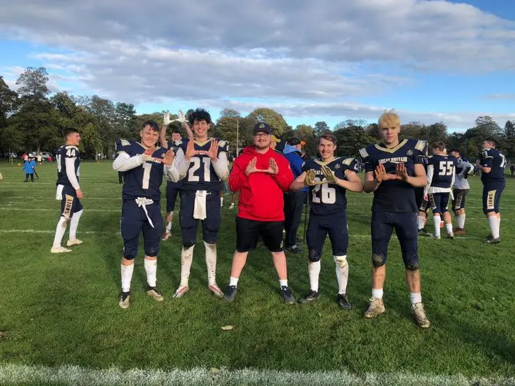 Charlie Martin, Fraser Galloway and Gabriel Wiseman with some teammates