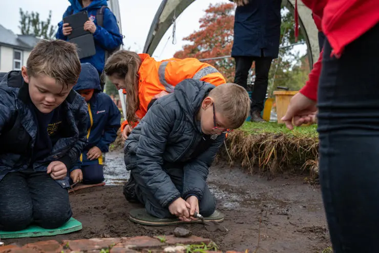 Fulwood and Cadley Primary school pupils Oliver and Rylee digging for pottery