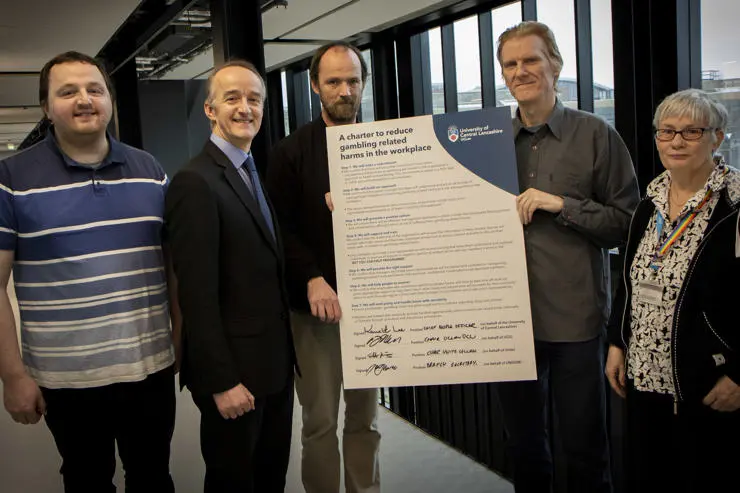 (L-R) Carl Kinvig, Unite Branch Secretary; UCLan Chief People Officer Ken Lee; Stuart Kinvig, Unite Branch Chair; Branch Chair of UCU Mick McKrell, and Sue Roylance, Branch Chair of Unison