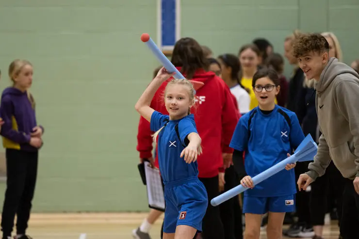 Children throwing javelins