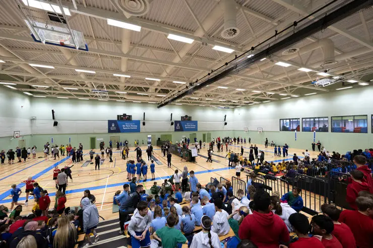 Children watching their classmates compete