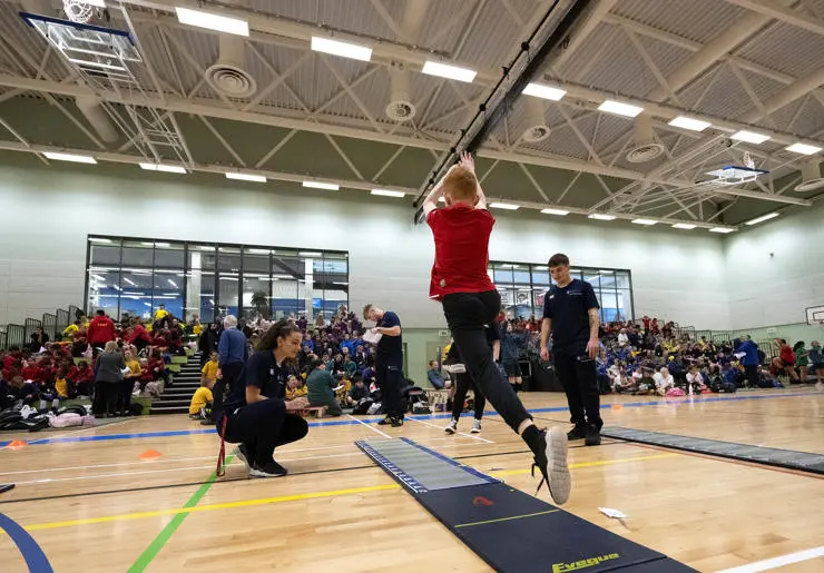 A pupil hanging in the air during a big jump