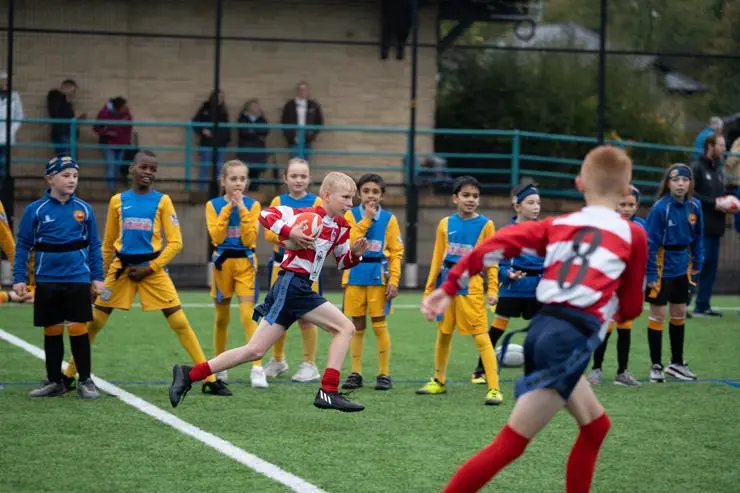 Pupils from Preston primary schools taking part in the Inspired by Wales Rugby League Tag Rugby League World Cup Festival