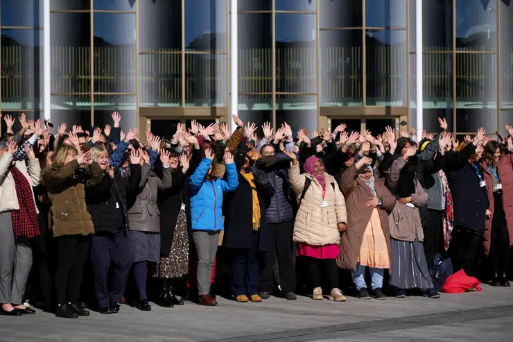 The crowd was in good spirits as they posed on the square