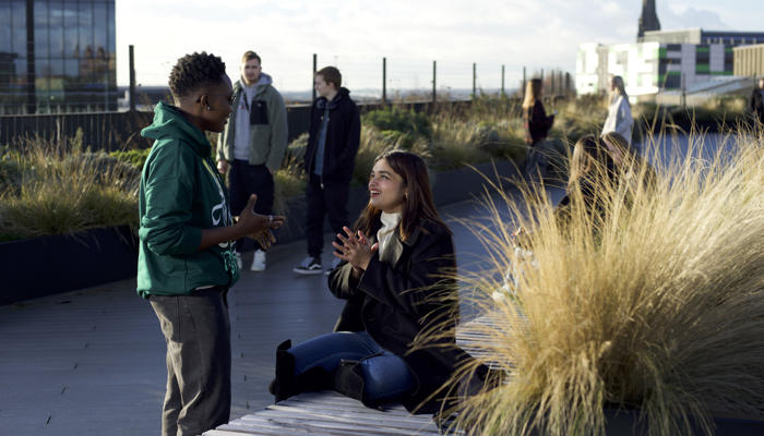 group of students on the student centre roof